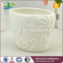 Diseño de flores Los titulares de vela de cerámica blanca al por mayor
